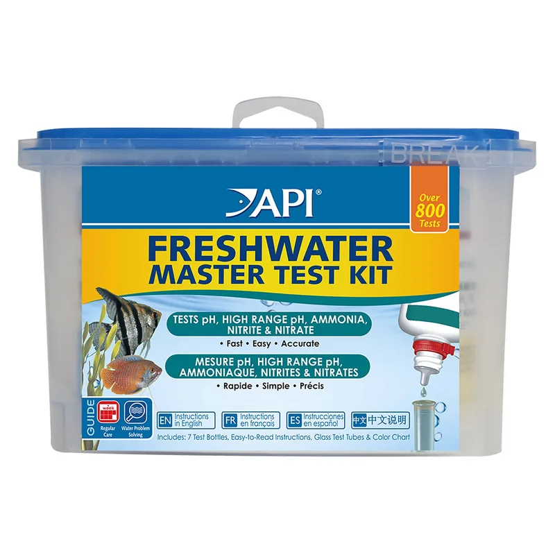 Testing aquarium water parameters with a liquid reagent kit — accurate testing every 2-3 days is how you track cycling progress